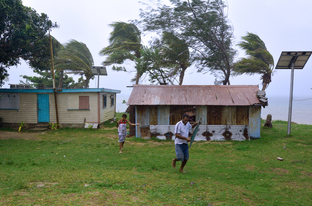 Fijian people runs to get shelter in Matacawa Levu during a Tropical Cyclone. On Feb 2016 Severe Tropical Cyclone Winston was the strongest storm in Fiji in recorded history.